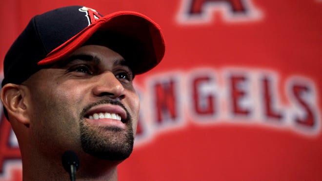 Pujols presser crop.jpg